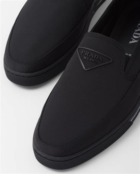 saks Prada slip ons